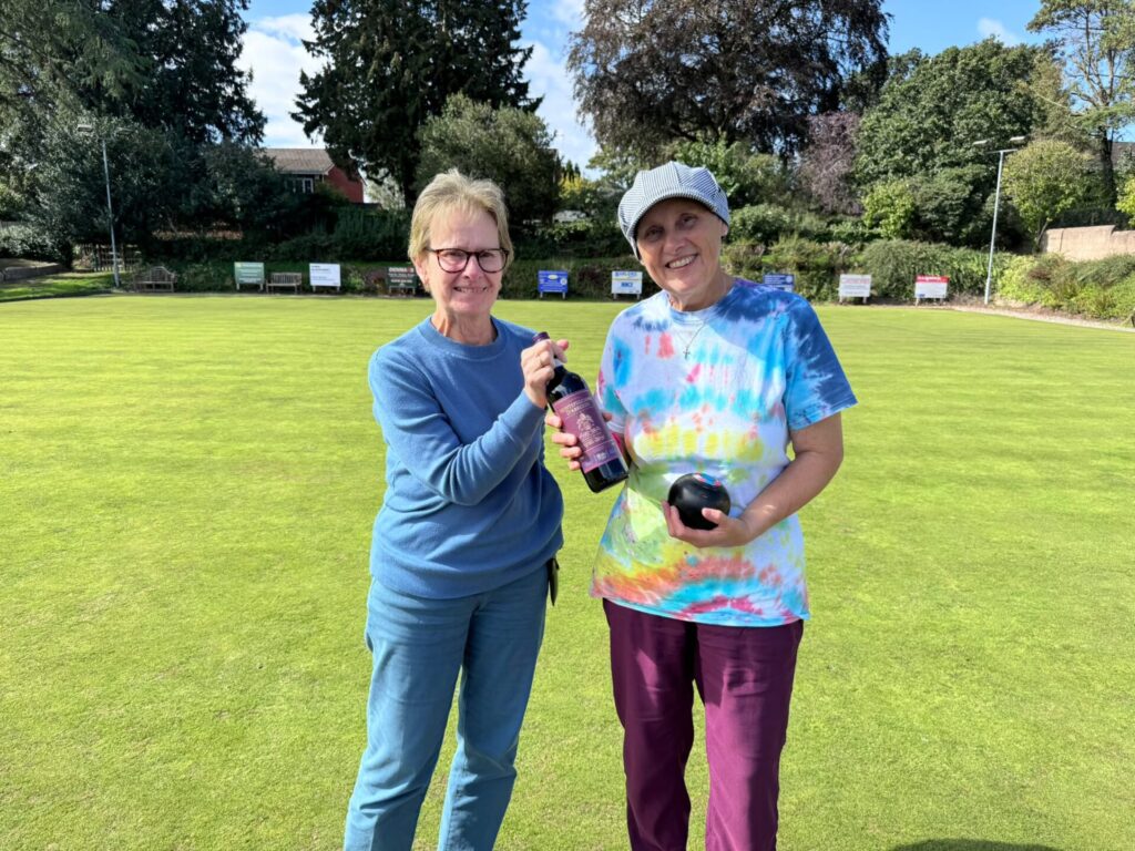 Angela receiving her prize for winning the "Spider"