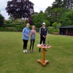 New and developing bowlers Margaret, Eilidh and Sam receiving their prizes.