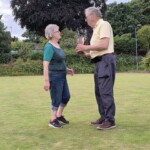 Ann presenting Richard with the winners cup